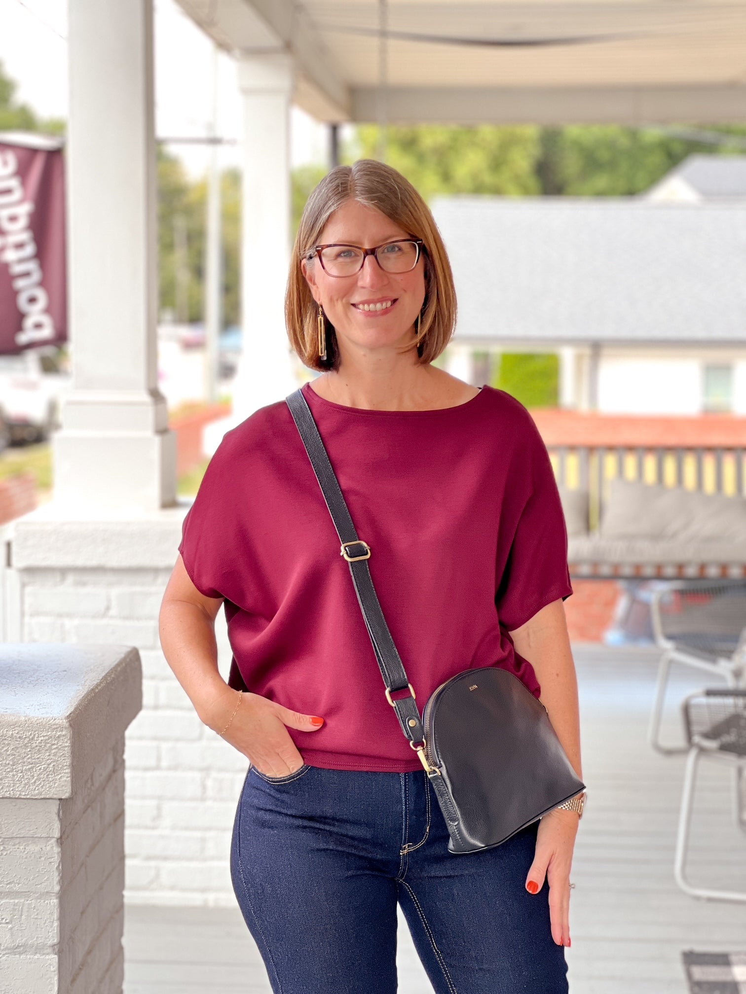 short sleeve wine colored boat neckline top