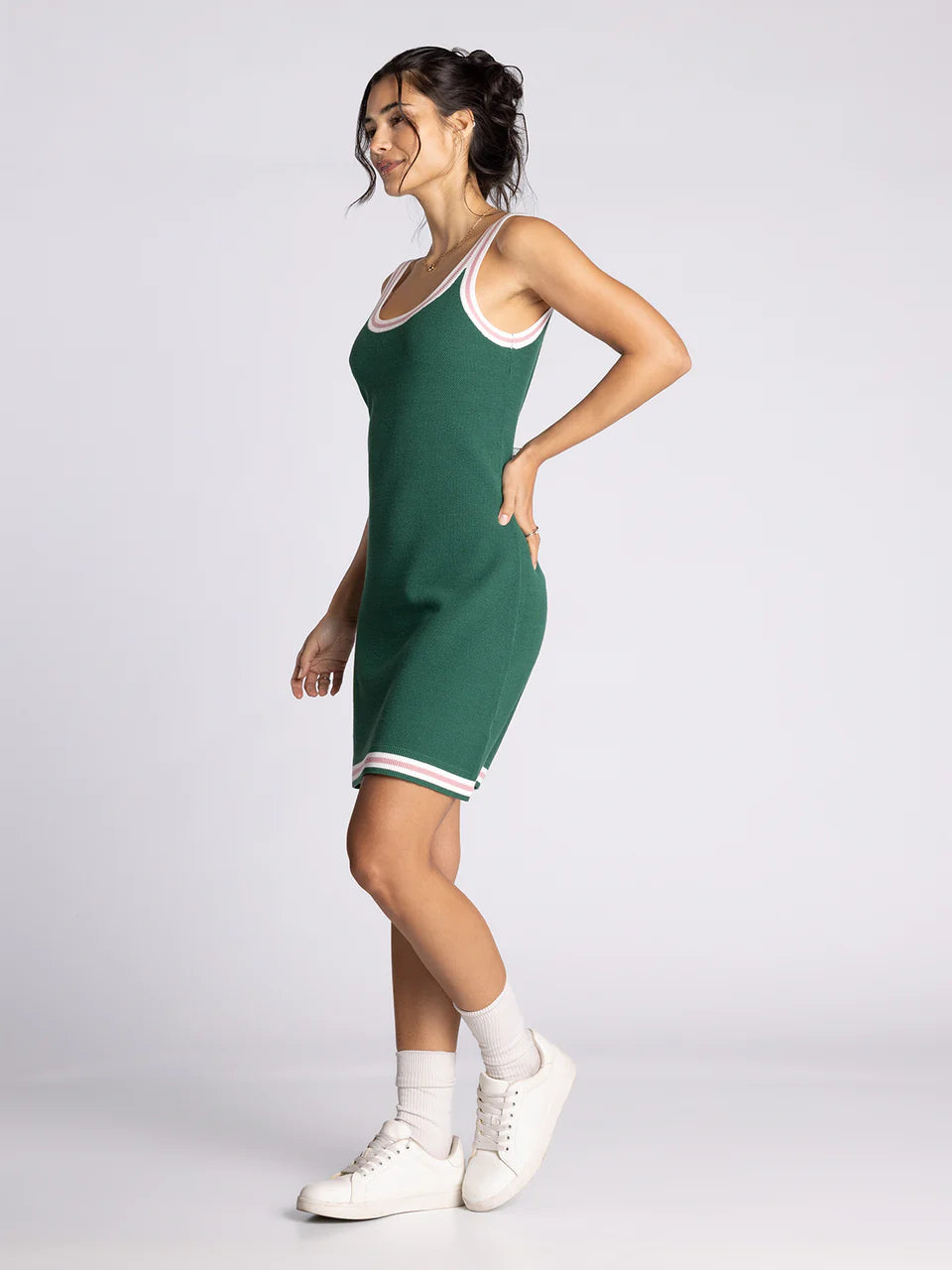 green tennis dress with white and pink outline, mini length, sleeveless