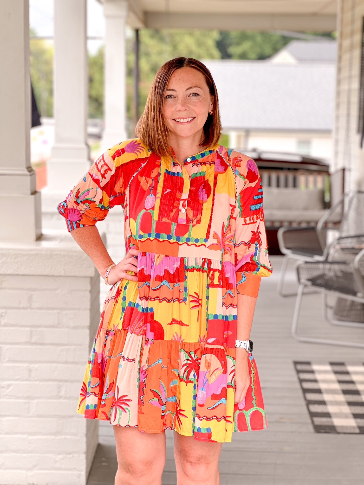 mini length dress in tropical yellow orange and red pattern