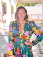 green floral dress, maxi length, with v neckline