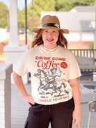 drink some coffee and handle your shit written on tee shirt
