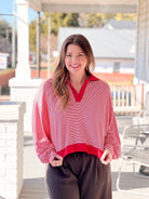 long sleeve shirt with collared neckline, red and white stripes