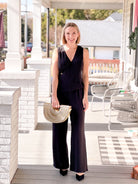black jumpsuit with v neckline