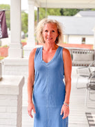 denim blue dress midi length with side slits and v neckline