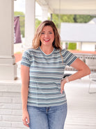 short sleeve top with small blue, green and white stripes, crew neckline