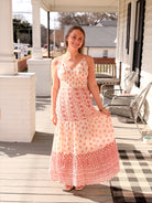 maxi length dress with pink floral pattern