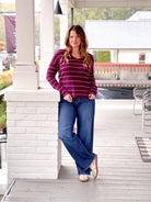 wine sweater with v neckline and long sleeves, small stripes