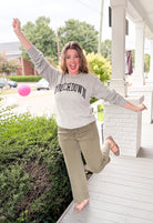 reversible grey hoodie with tailgate written on one side and touchdown written on the other