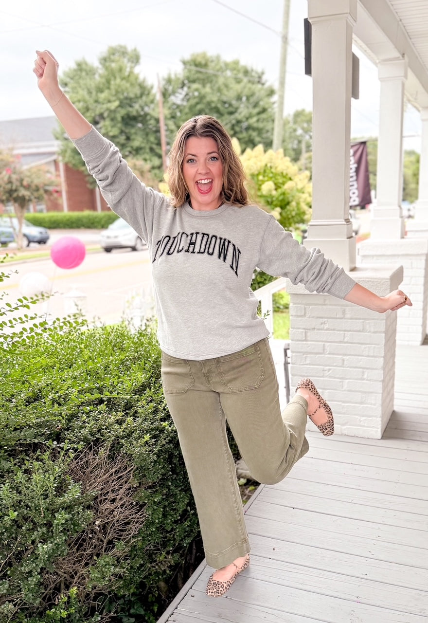 reversible grey hoodie with tailgate written on one side and touchdown written on the other