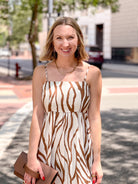 midi length cream dress with brown pattern