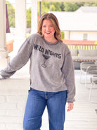 reversible sweatshirt with lazy days written on one side and wild nights written on the other side