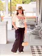 drink some coffee and handle your shit written on tee shirt