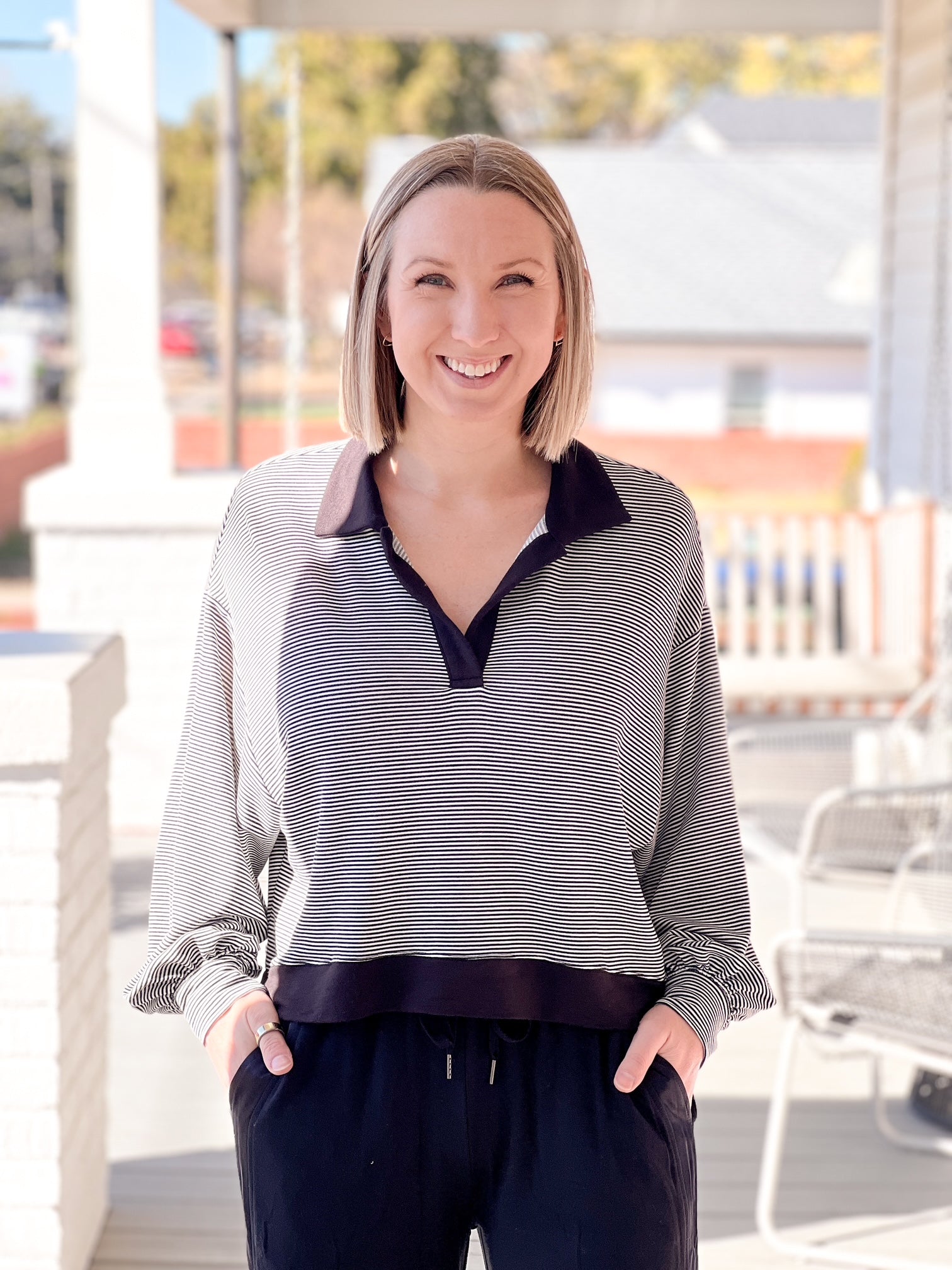 long sleeve shirt with collared neckline, black and white stripes