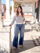 ivory sweater with blue stripes