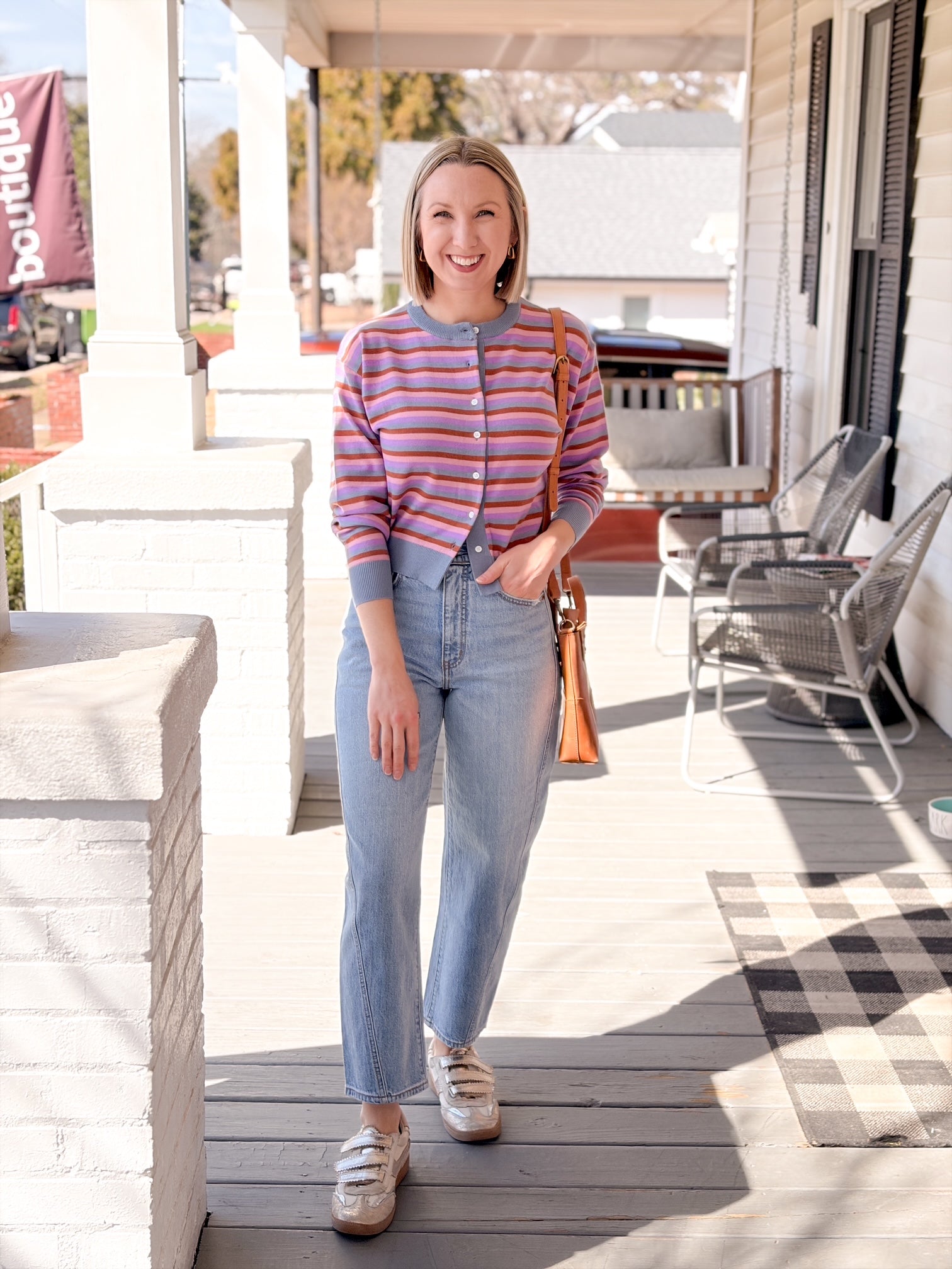 cardigan with light blue, pink, red and purple stripes