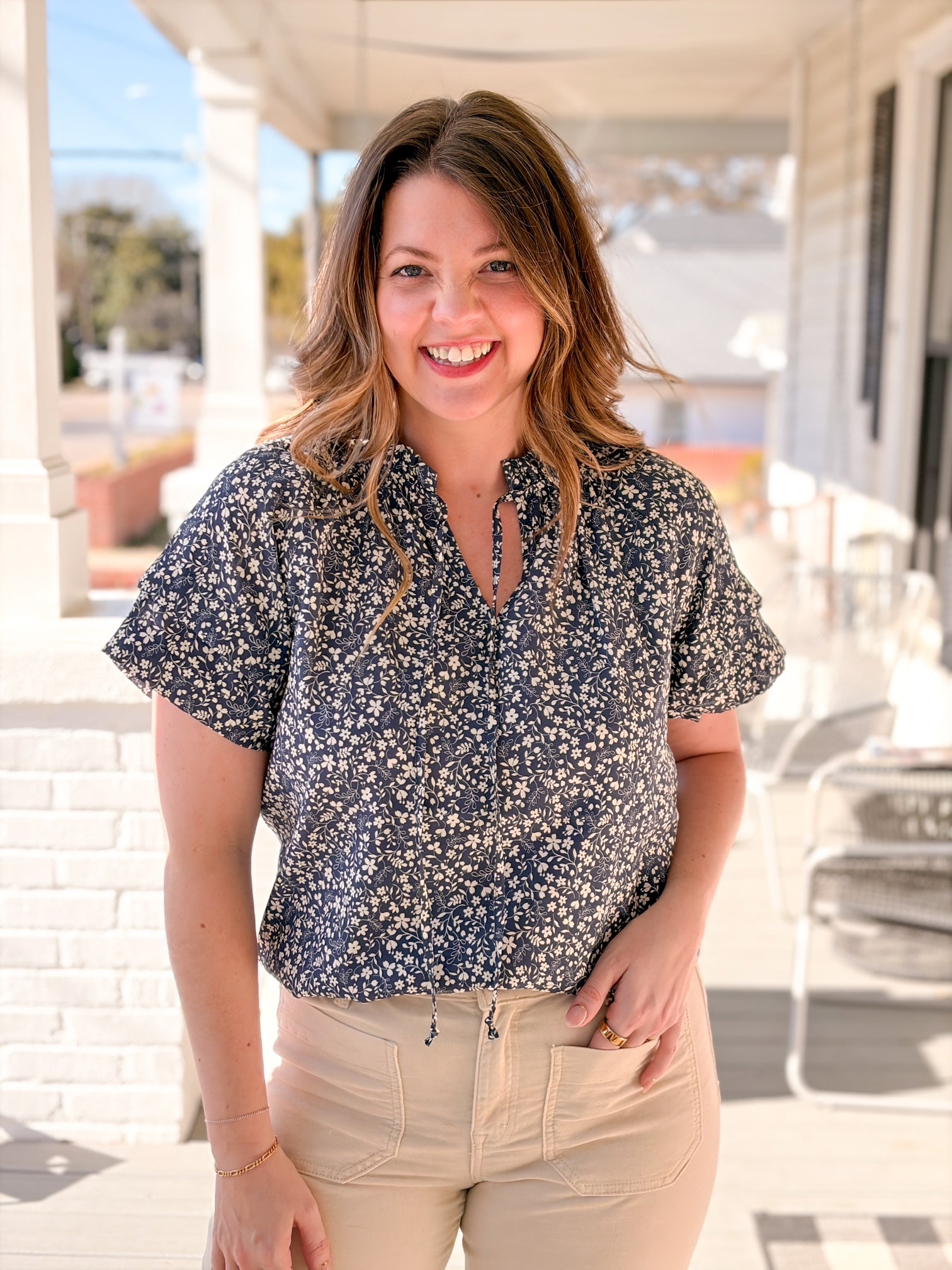 short sleeve top with navy floral pattern