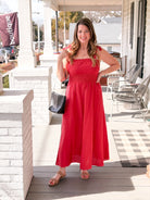 red midi length dress with tie straps