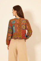 multi colored long sleeve printed top