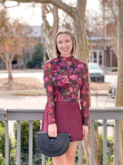 long sleeve top with crew neckline and berry floral pattern