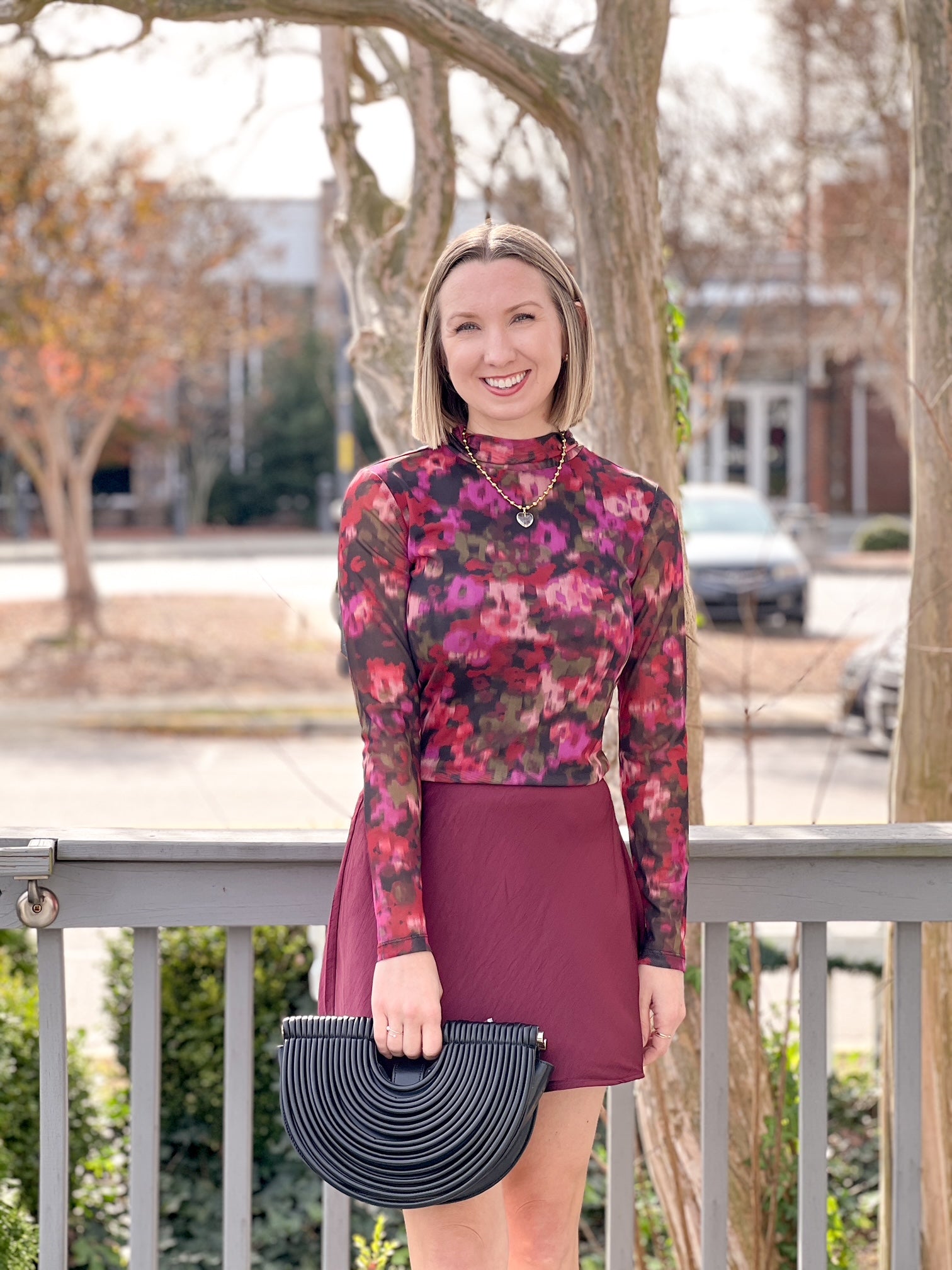 long sleeve top with crew neckline and berry floral pattern