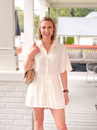 short sleeve, collared, button up romper in white