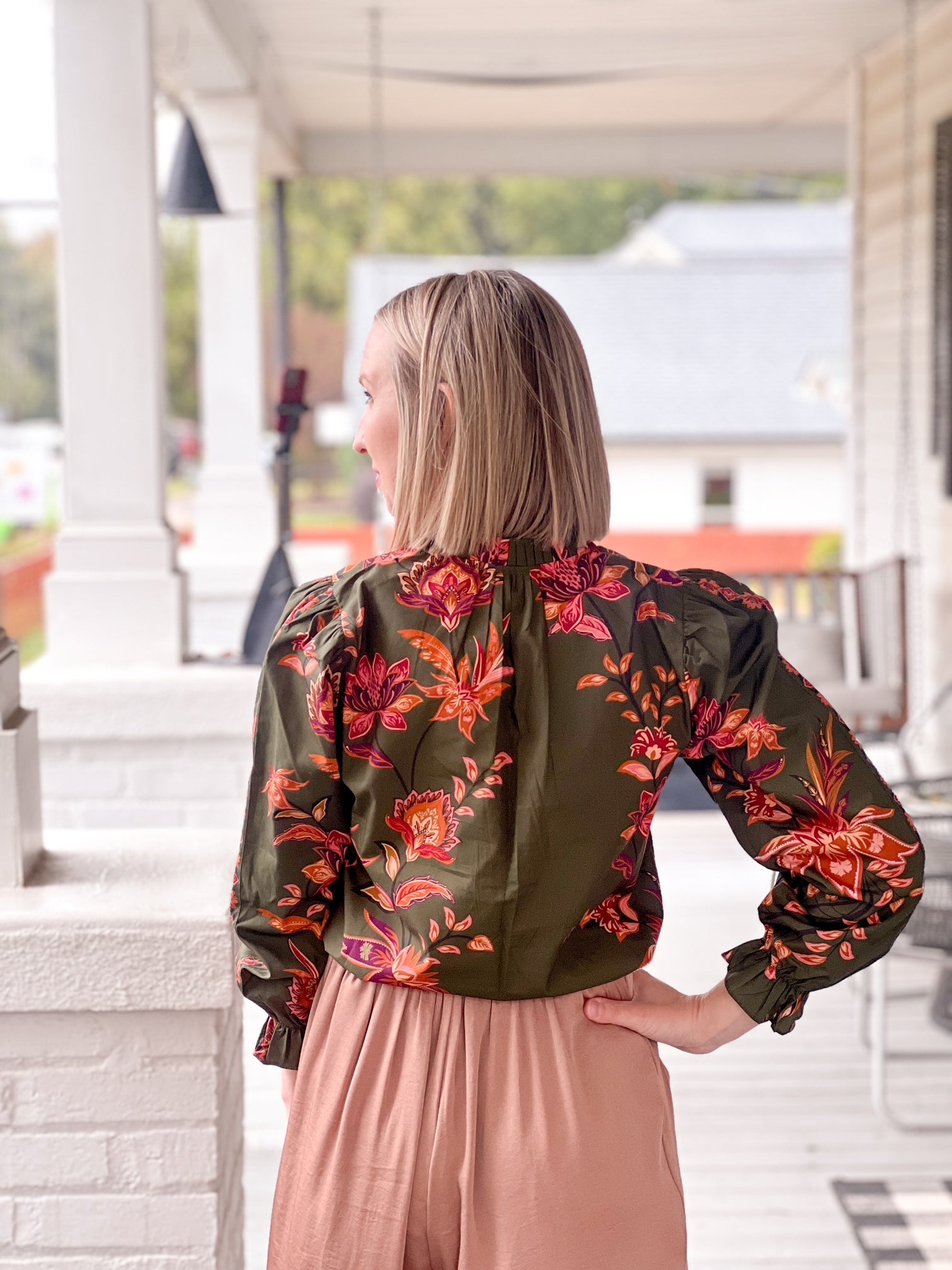 long sleeve work top in olive with pink and orange floral pattern