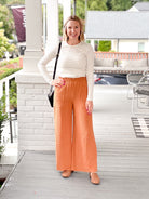 wide leg orange pants with elastic waist
