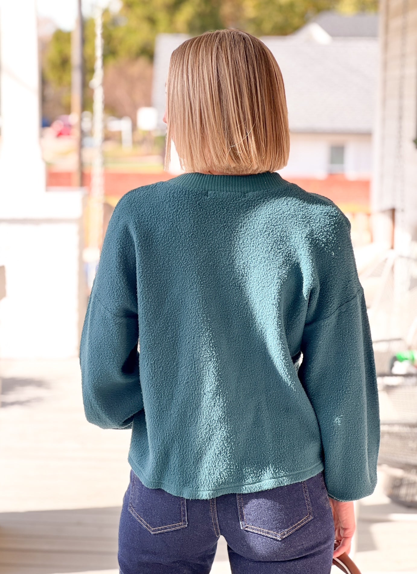 teal sweatshirt