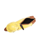 dog wearing a yellow raincoat & hat crossbody bag 