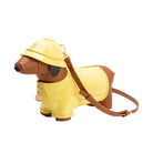 dog wearing a yellow rain coat & hat crossbody bag 