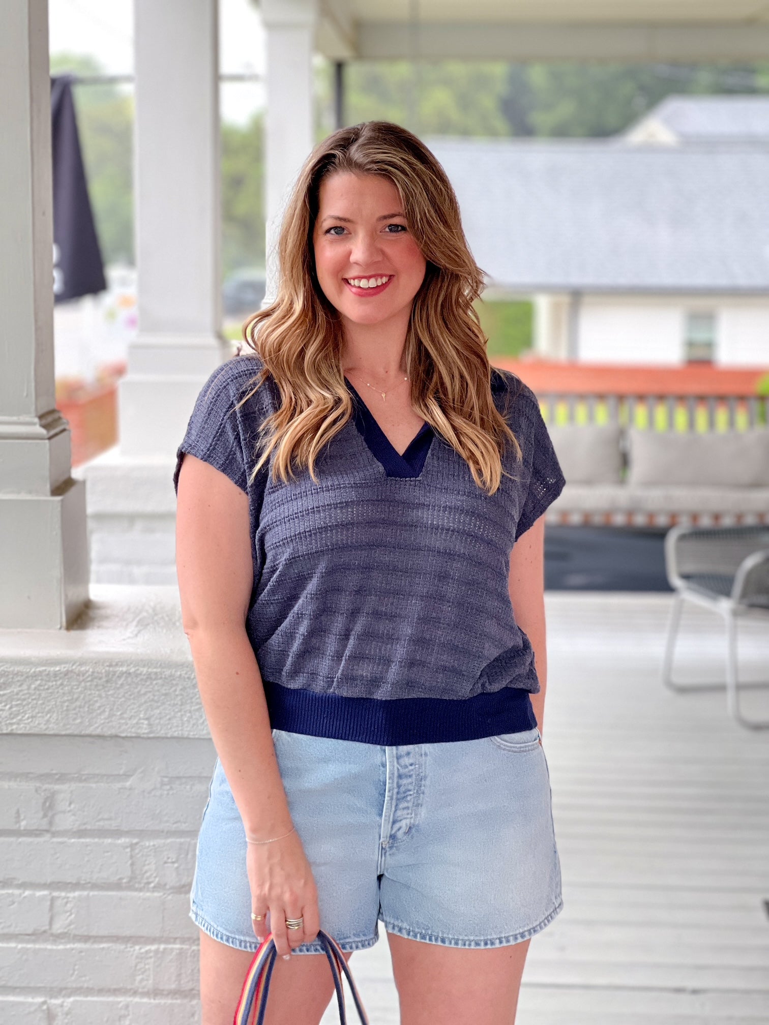 short sleeve navy top with v neckline 