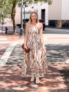 midi length cream dress with brown pattern