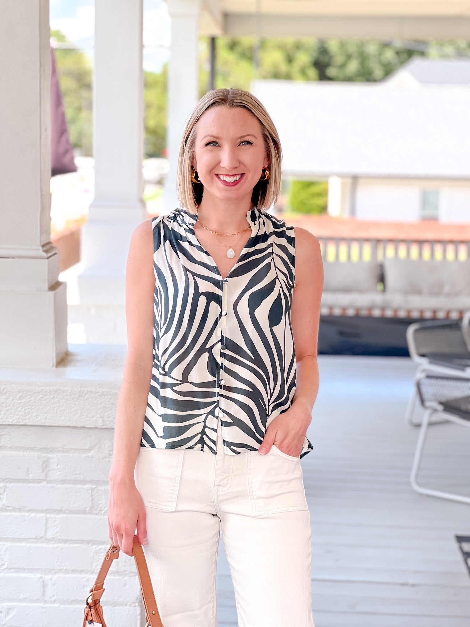 green and ivory tropical print top for workwear, button up front, sleeveless