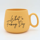 Yellow Jumbo Mug that says "What a Fucking Day"