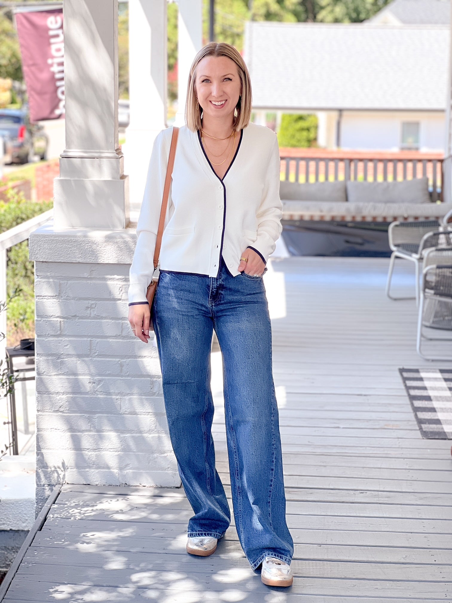 white cardigan with navy outline